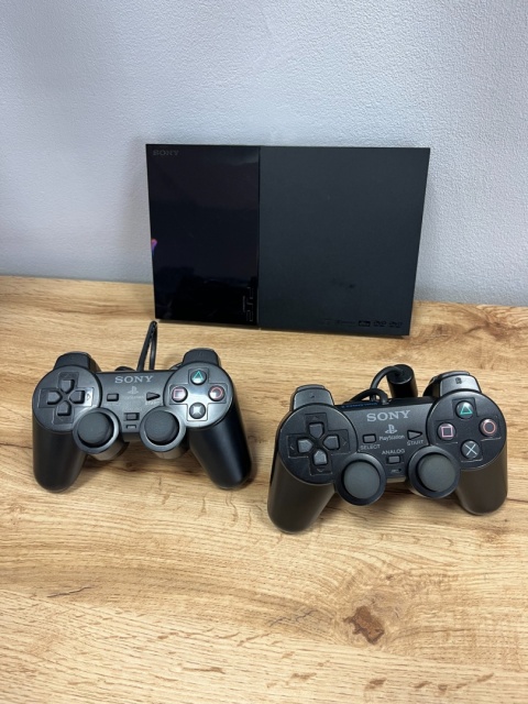 Konsola PlayStation 2 Slim + 2 Pady PS2 DualShock 2 Używane Konsola PlayStation 2 Slim + 2 Pady PS2 DualShock 2 Używane